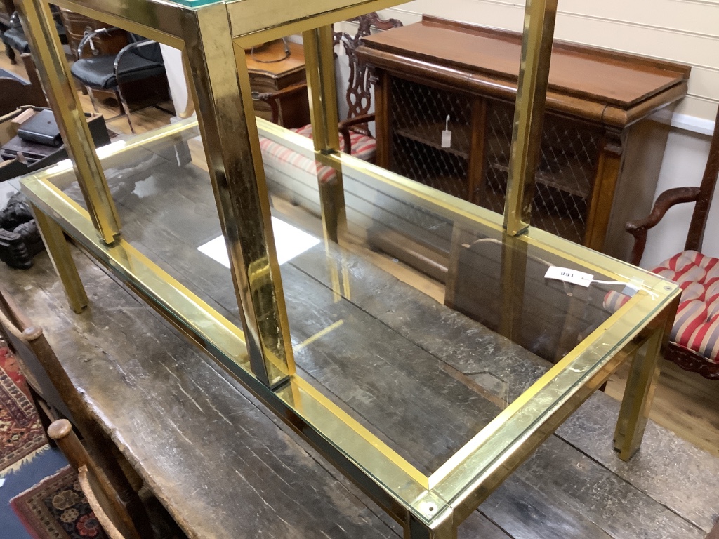 Two Italian Romeo Rega brass glass top low tables, circa 1970, larger 130cm, height 60cm